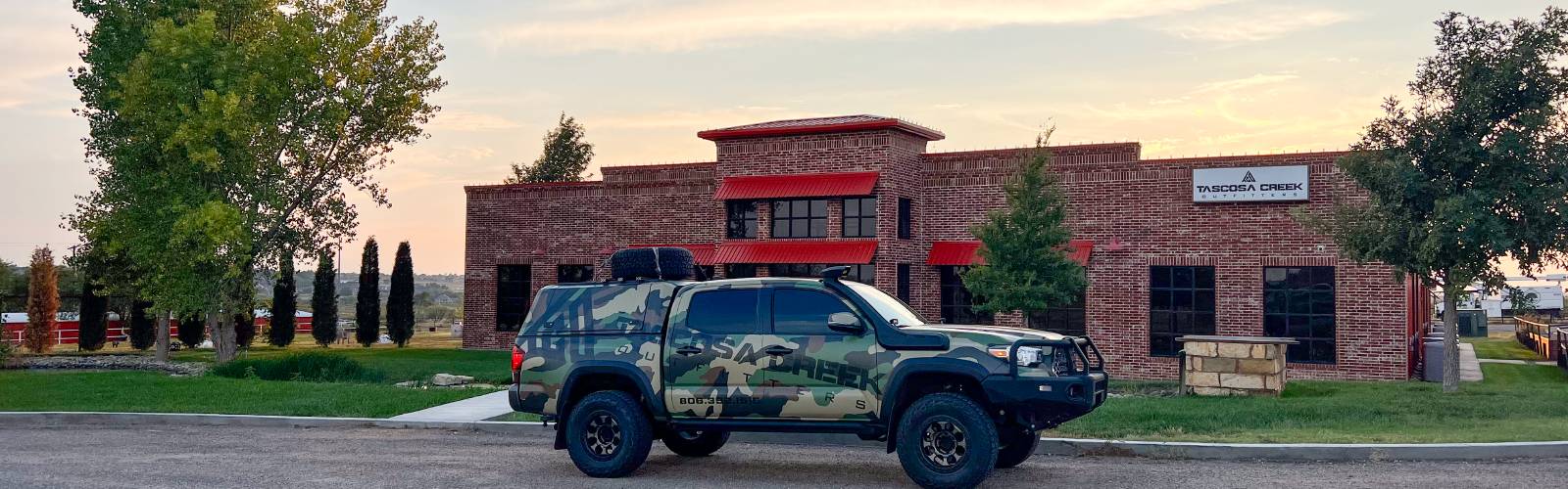 Image of the TCO storefront, located in Amarillo, Texas. The TCO truck is parked in front.